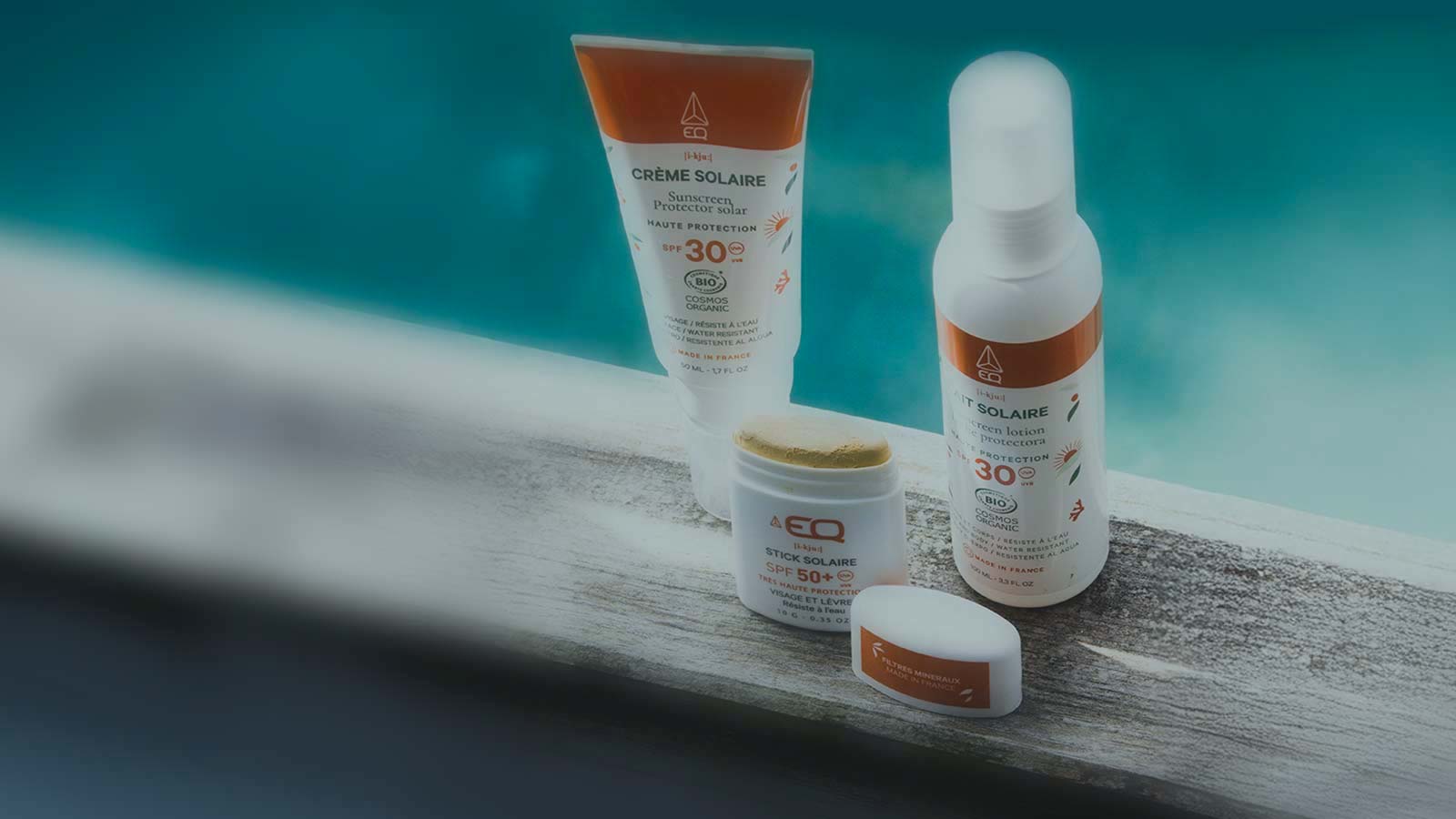 Various EQ sunscreens on a table. Protect Yorself from harmful UV Sun rays.