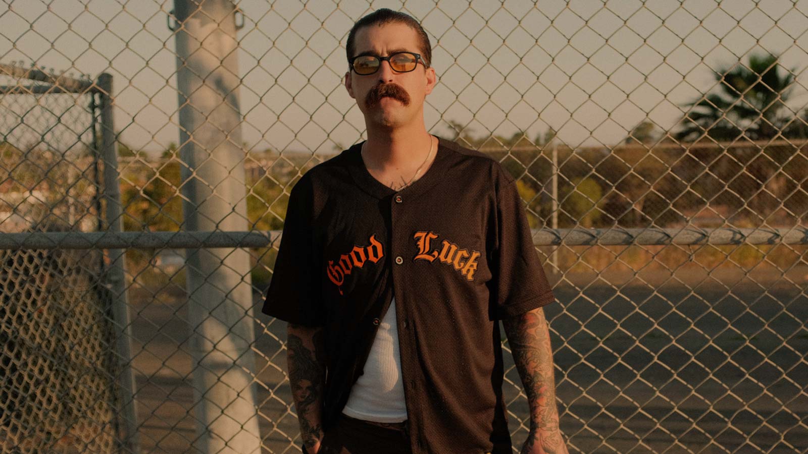 Brown T Shirt, Woven Shirt. Baseball field. Our casual T-shirts, Shortsleeves and Tank Tops are made for those who carry the water lifestyle everywhere they go.