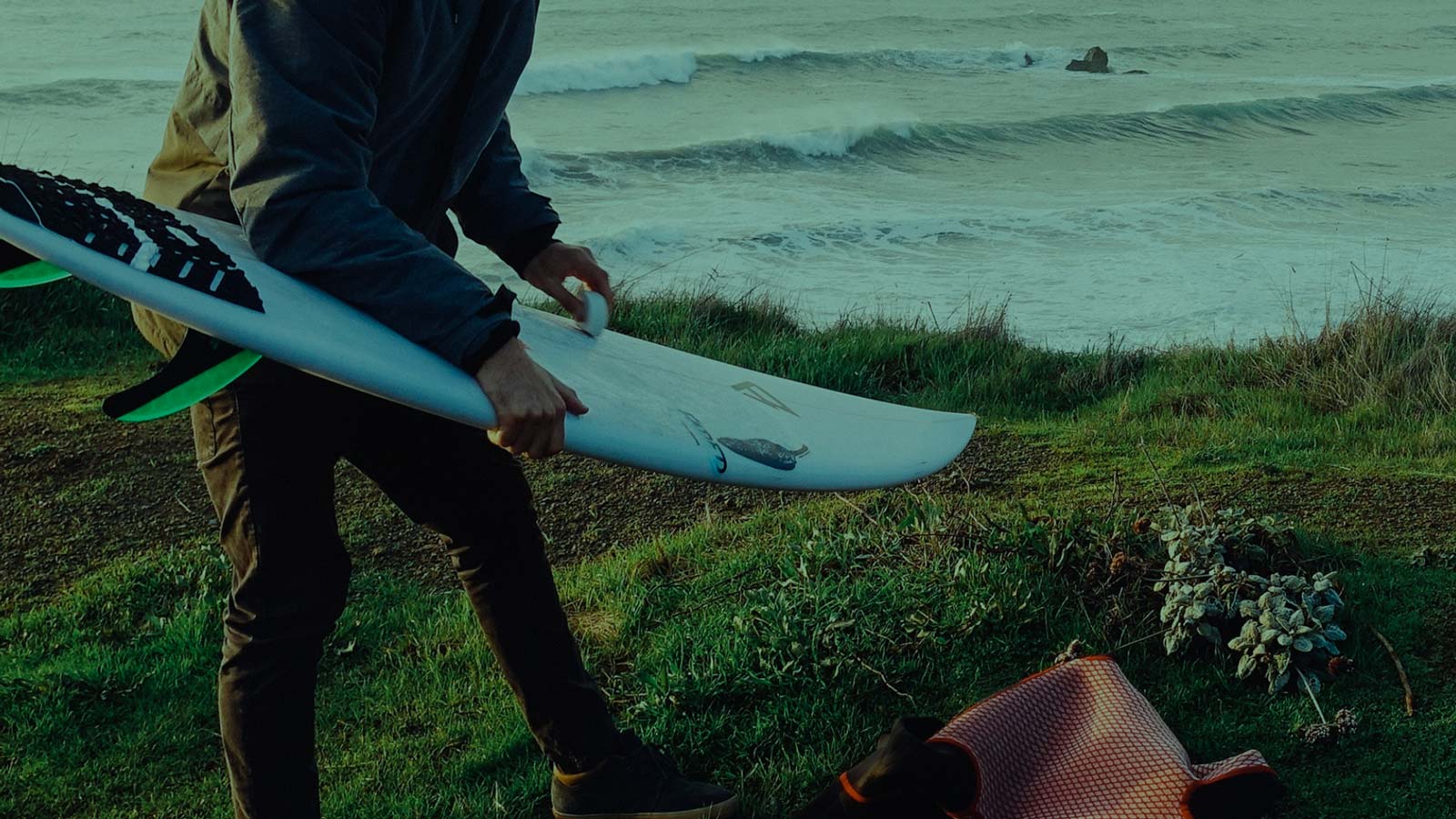 Waxing a Surfboard. Sets of Waves. Beach.